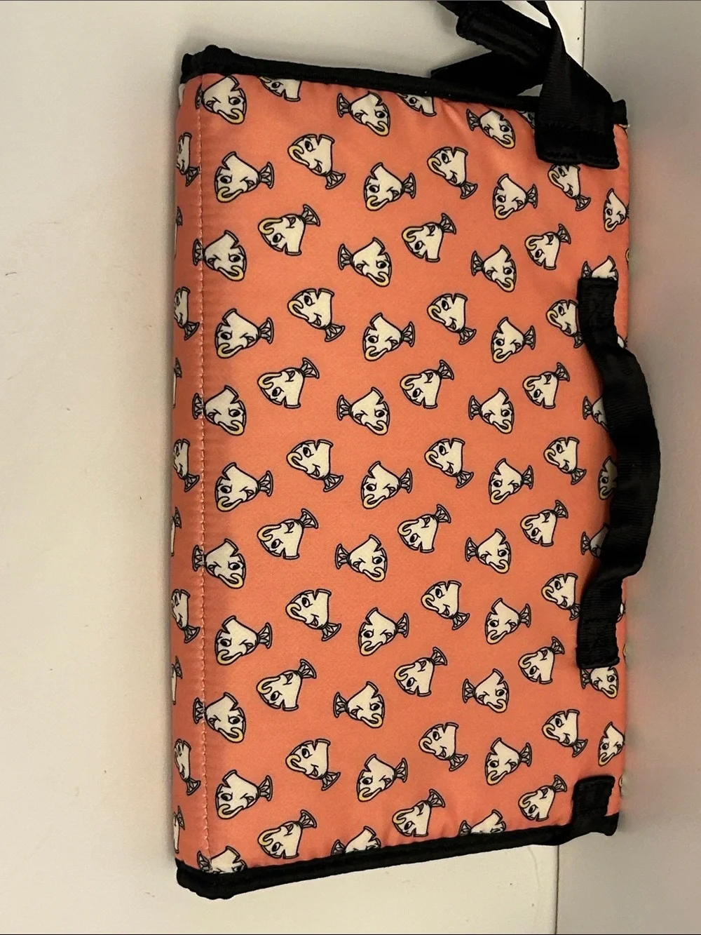 Petunia Pickle Bottom Coral Pouch with White Dog Print and Black Trim